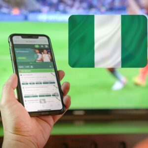 Nigeria Flag Next Phone in Hand with Betting Mobile App